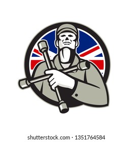 Illustration of a British mechanic worker wearing hat holding tire wrench, 4-way lug wrench or tyre iron on chest looking up set in shield with Union Jack flag in background in retro style. 