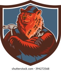 Illustration of a builder handyman Russian bear or Eurasian brown bear wearing hat arms folded with tools hammer and wrench facing front set inside crest shield done in retro woodcut style. 