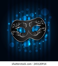 Illustration carnival or theater mask on blue shimmering  background - vector