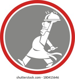 Illustration of a chef, cook or baker holding serving plate platter of food set inside circle walking viewed from side done in retro style.
