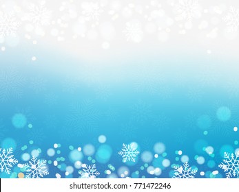 Illustration of Christmas background with blue and white snowflakes and bokeh