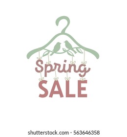 Illustration of clothes hangers with attached thereto the letters "spring sale".