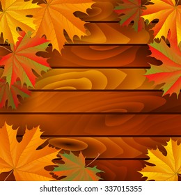 Illustration of colorful autumn maple leaves on wooden background
