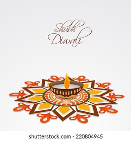 Illustration of a colourful rangoli and a decorated illuminated lampion with stylish text.  