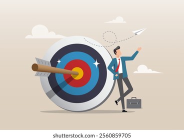 An illustration of confident businessman stand with arrow hit bullseye on archery target. Business objective, aspiration and motivation to achieve goal concept