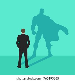 illustration of a confident handsome business man standing with his arms folded with superhero shadow