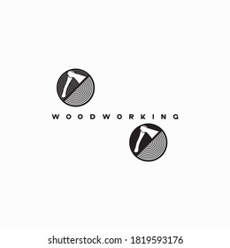 
an illustration consisting of an image of an ax plowing a tree and the inscription "woodworking"