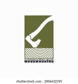 
an illustration consisting of an image of an ax plowing a tree and the inscription "woodworking"