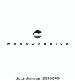 
an illustration consisting of an image of a chisel plowing a tree and the inscription "woodworking"
