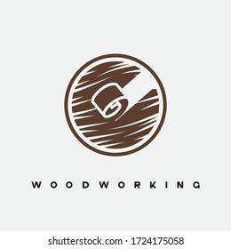 
illustration consisting of a picture of a piece of wood and the inscription "woodworking" in the form of a symbol or logo