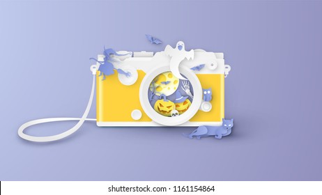 Illustration of creative design for halloween with decoration inside compact camera lens. Graphic design for halloween. Cute halloween. paper cut and craft style. vector, illustration.