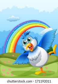 Illustration of a cute bird at the hilltop with a rainbow in the sky