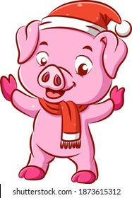 The illustration of the cute pink pig is dancing her body using the Christmas hat and the scarf