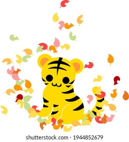 Illustration of a cute tiger standing in the fallen leaves of autumn