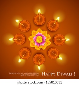 illustration of decorated Diwali diya on flower rangoli