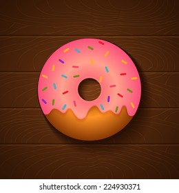 illustration of a donut on wooden background