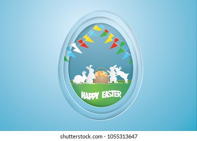 Illustration of Easter day concept.Eggs in basket on grass surrounded by family rabbit  in blue background ,paper craft style