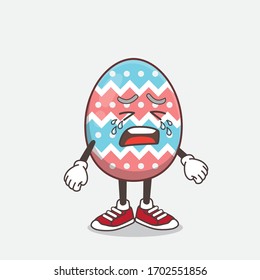 An illustration of Easter Egg cartoon mascot character with crying expression