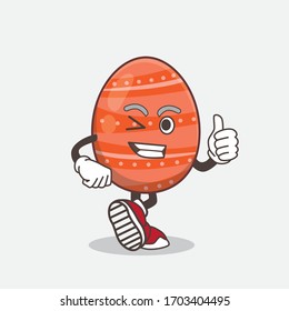 An illustration of Easter Egg cartoon mascot character making Thumbs up gesture