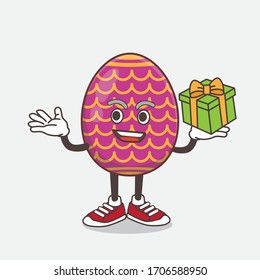 Una ilustración del personaje de la mascota Huevo de Pascua con una caja de regalo