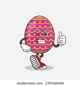 An illustration of Easter Egg cartoon mascot character making Thumbs up gesture