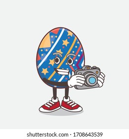 An illustration of Easter Egg cartoon mascot character as photographer in action with a camera
