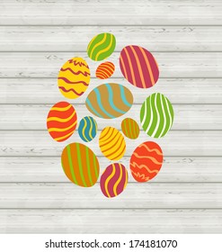 Illustration Easter ornamental eggs on wooden background - vector