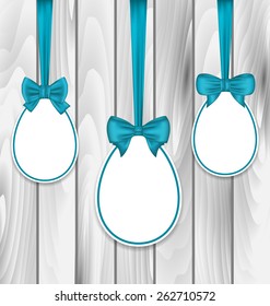 Illustration Easter paper eggs wrapping blue bows on wooden grey background - vector