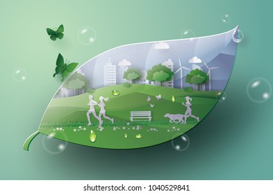  Illustration of eco concept,green city in the leaf. Paper art and digital craft style.