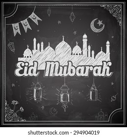 illustration of Eid Mubarak (Happy Eid) greeting on chalkboard background