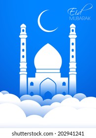 illustration of Eid Mubarak with mosque and sky.