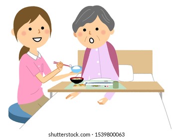 An illustration of the elderly lady assisted by a meal nurse.