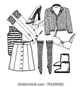 Illustration of elements of a female wardrobe. Wool jacket, stockings, striped t-shirt, bra, jeans skirt. Old fashioned shoes. Sunglasses. Chaos in female wardrobe. Vector illustration. Doodle.
