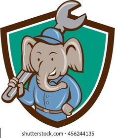 Illustration of an elephant mechanic holding spanner on shoulder viewed from front set inside shield crest on isolated background done in cartoon style. 