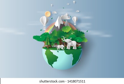 illustration of elephants in green trees forest,Creative Origami design world environment and earth day concept.Landscape Wildlife with Deer in green nature plant by rainbow,balloons.paper cut,craft