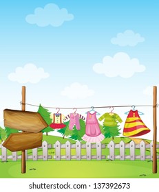 Illustration of an empty wooden arrowboard near the hanging clothes