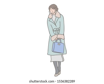 An illustration of a fashionable adult woman in winter.
