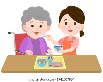 
Illustration Of A Female Caregiver Feeding A Grandmother A Meal