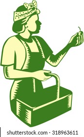 Illustration of a female fruit picker fruit worker wearing bandana holding basket and fruit  viewed from the side set on isolated white background done in retro woodcut style. 