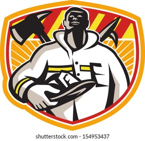 Illustration of a fireman fire fighter emergency worker looking up holding visor helmet with fire axe and hook pike pole crossed set inside shield done in retro style.