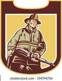 Illustration of a fireman fire fighter emergency worker holding fire hose viewed from front set inside shield done in retro style.