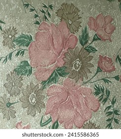 illustration of flower and leaf motifs on fabric with a combination of colors that gives a vintage impression
