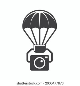 illustration of flying camera with parachute. 