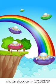 Illustration of the flying saucers in the sky near the rainbow