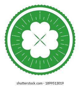 Illustration of a four leaf clover in a green circle on a white background