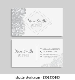 illustration of front and back of corporate business card with floral design