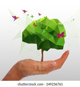 Illustration of geometric polygonal tree in hand 