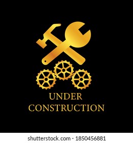 illustration graphic vector under construction for your website. screwdriver and wrench golden icon