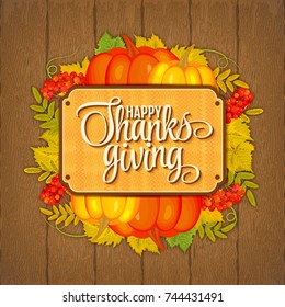 Illustration of greeting card for Thanksgiving with pumpkin and autumnal leaves on wooden background 