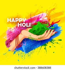 illustration of hand holding colorful gulaal (powder color) for Happy Holi